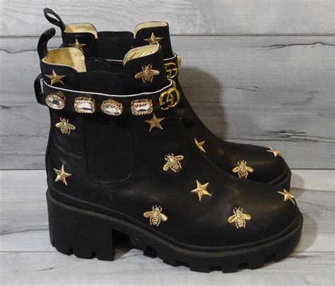 gucci black boots with gold bees|Gucci black boots with bees.